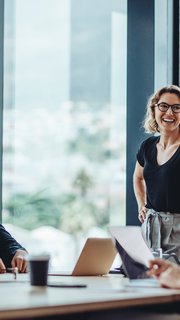 Business people having casual discussion during meeting